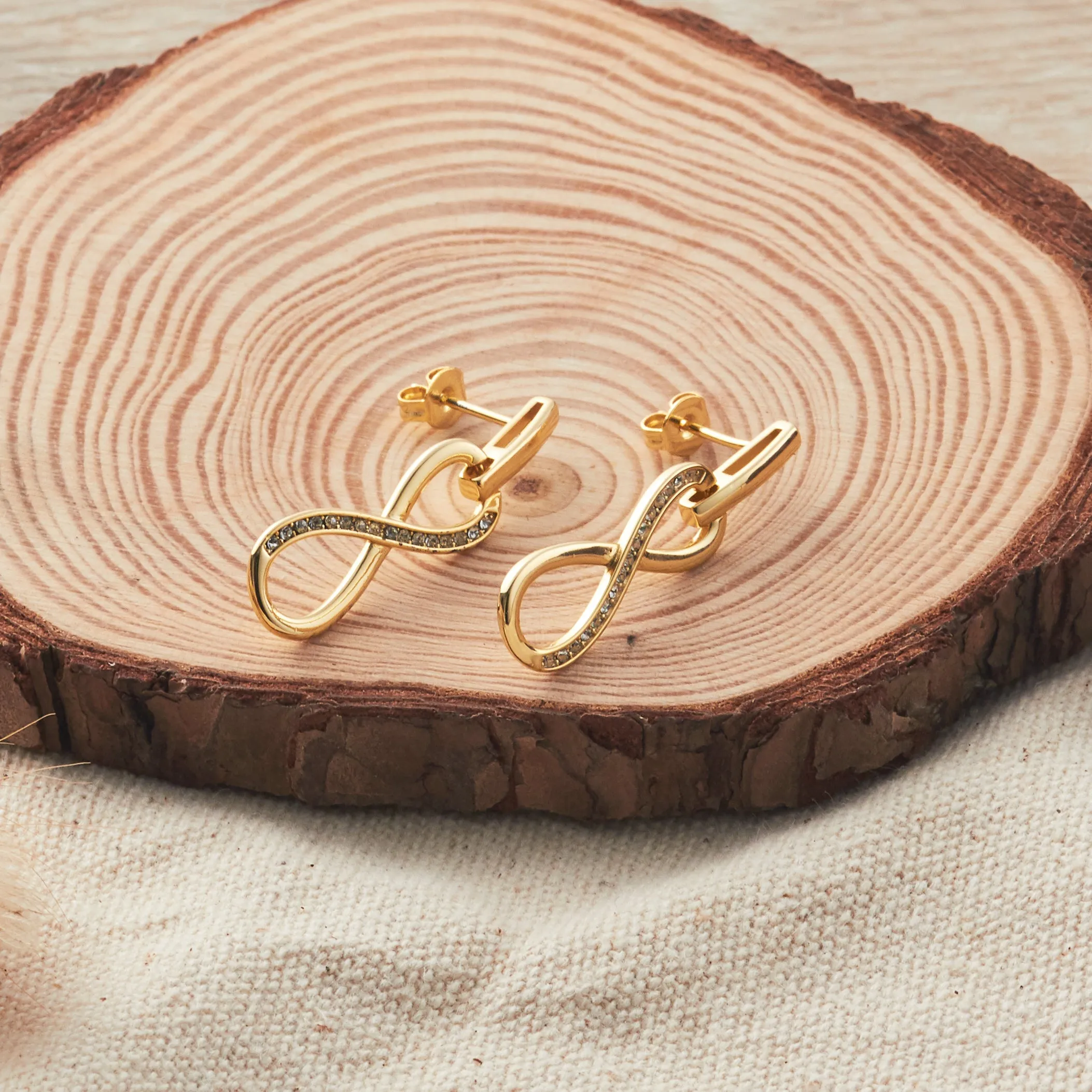 Gold Plated Infinity Drop Earrings Created with Zircondia® Crystals