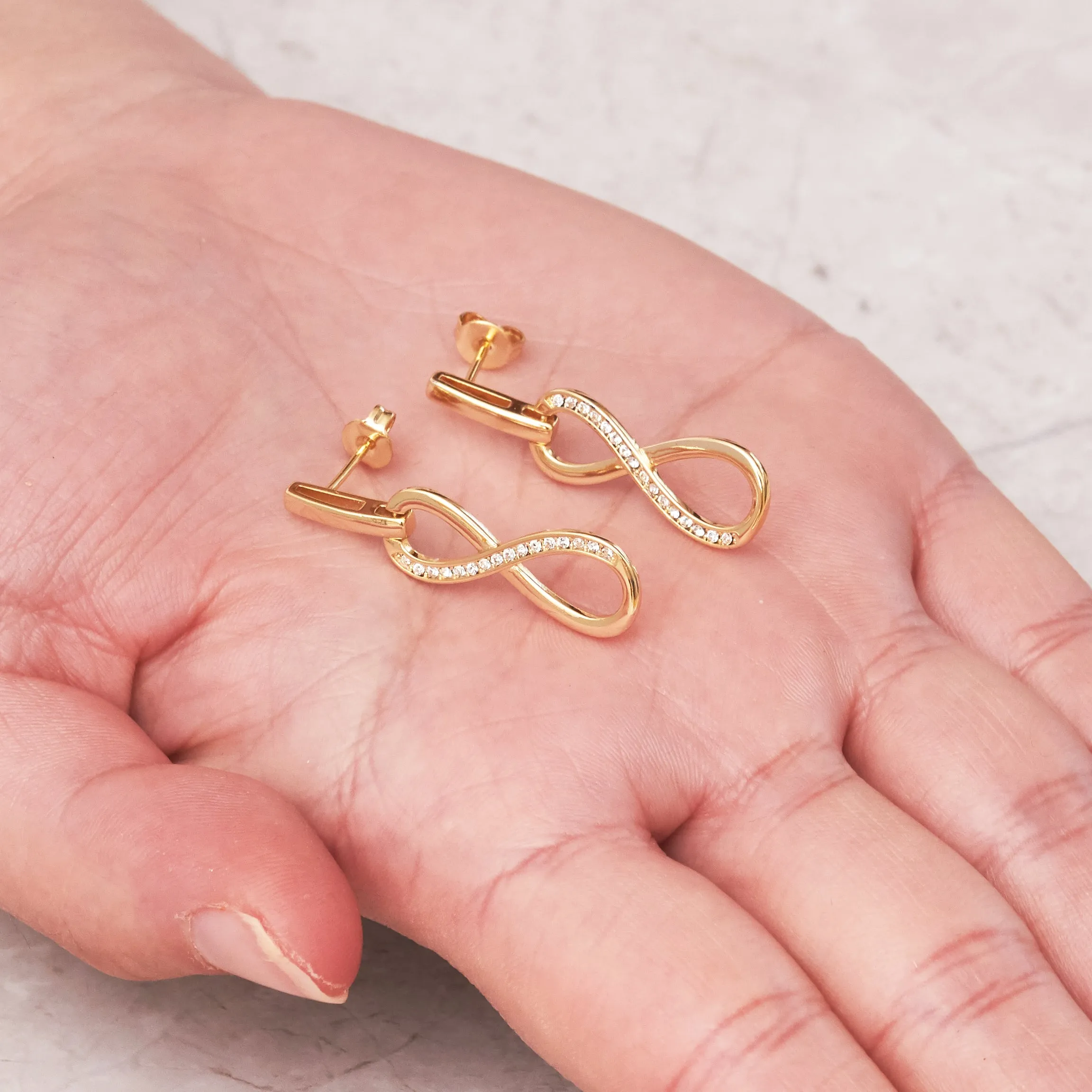 Gold Plated Infinity Drop Earrings Created with Zircondia® Crystals