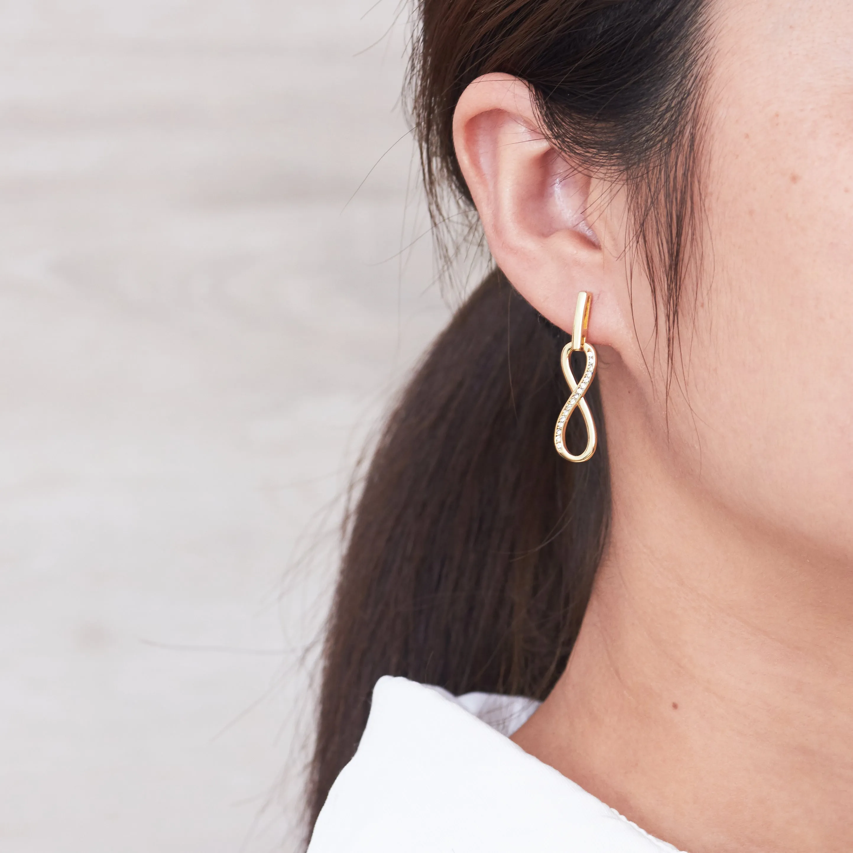 Gold Plated Infinity Drop Earrings Created with Zircondia® Crystals